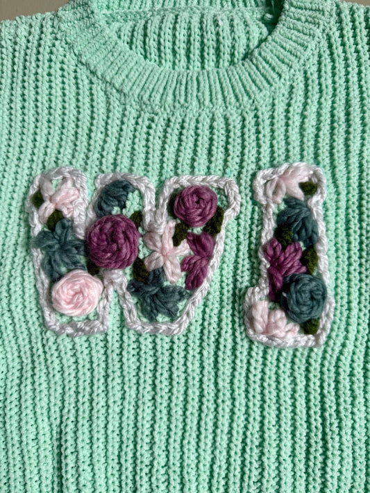 033 - Turquoise Embroidered Floral WI Pride Sweater Size 6-7 Girls