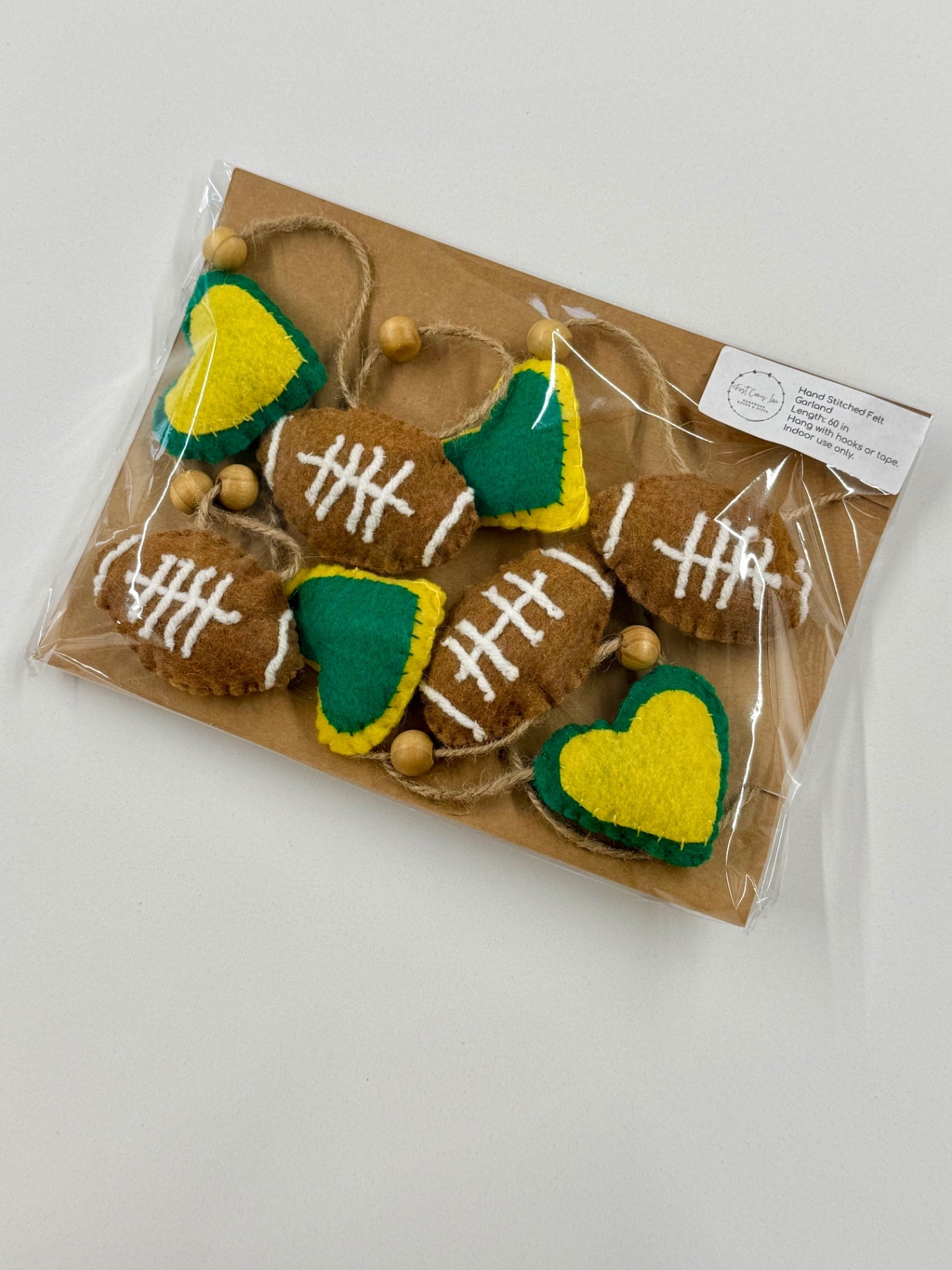 047 - Stitched Felt Packers Football & Heart Garland – 60" with Wood Bead Accents