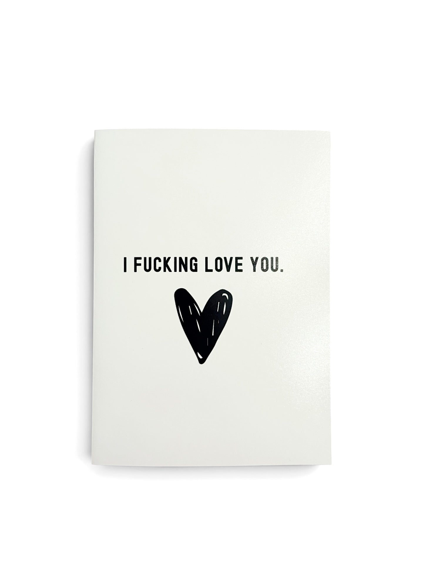 A white rectangular card with the text 'I FUCKING LOVE YOU.' in black uppercase letters and a black heart graphic below, shown on a white background.