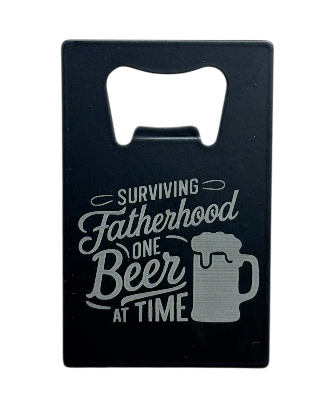 "Surviving Fatherhood One Beer at a Time" Engraved Black Metal Bottle Opener