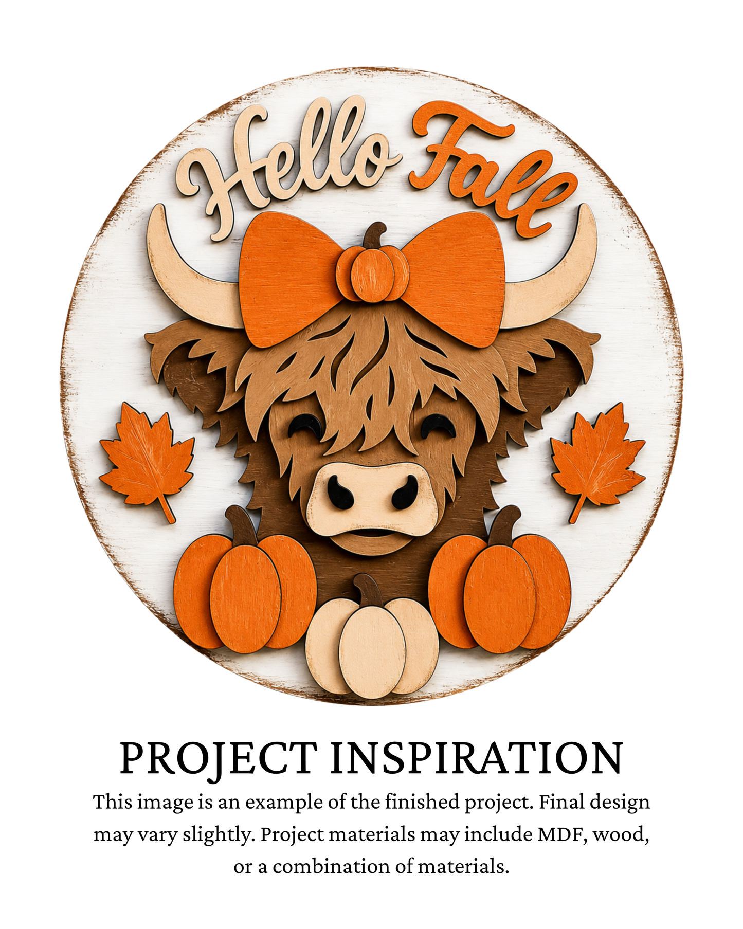 Finished project example of a layered round fall door sign featuring a shaggy brown Highland cow surrounded by orange and white pumpkins and autumn leaves with “Hello Fall” lettering. Text below reads “Project Inspiration.”