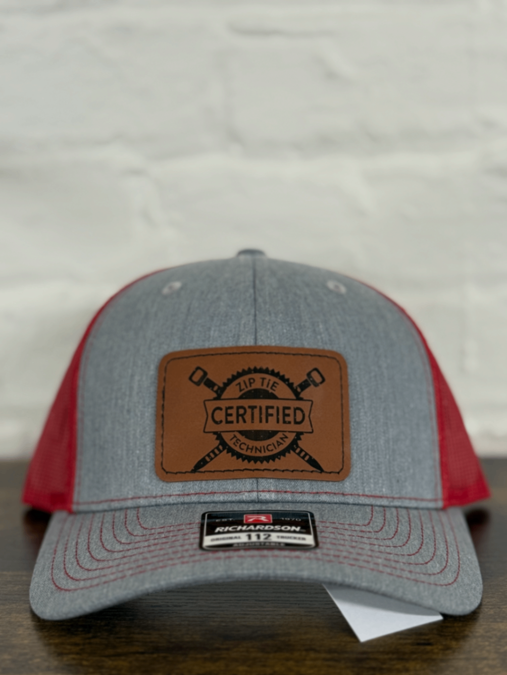 "Zip Tie Certified Technician" Engraved Leather Patch Trucker Hat