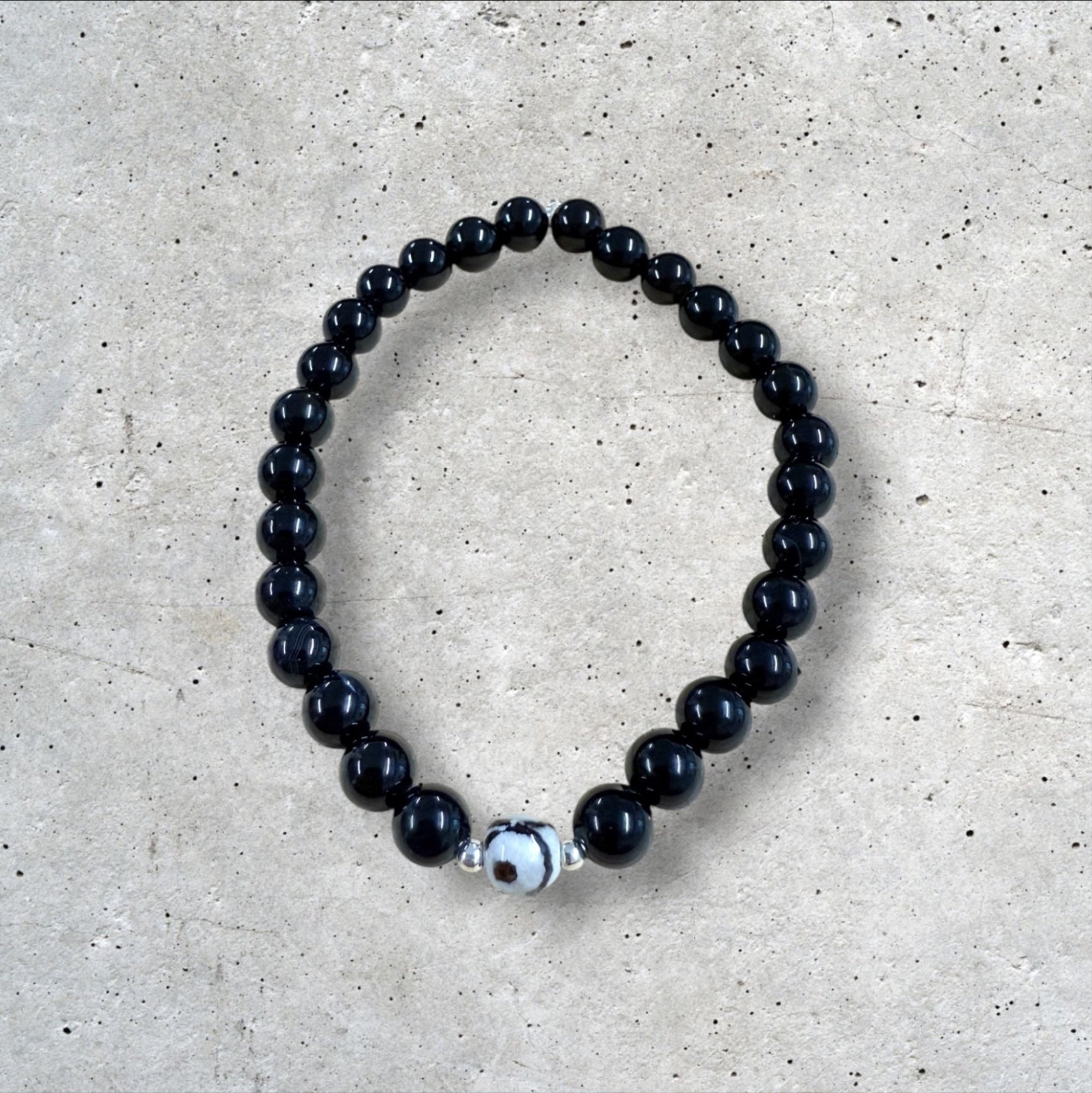 Black Beaded Bracelet with White Marbled Accent