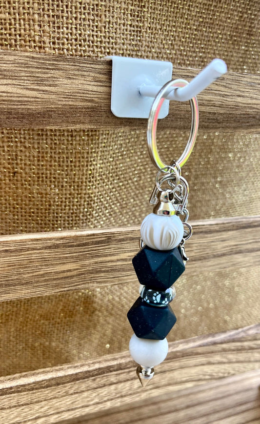 Color Burst Black and White Paw Print Silicone Bead Keychain