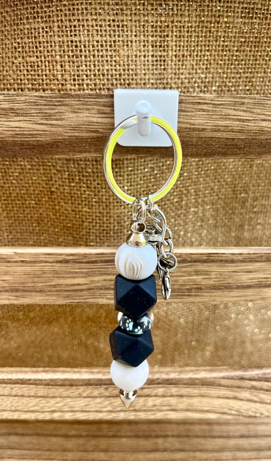 Color Burst Black and White Paw Print Silicone Bead Keychain