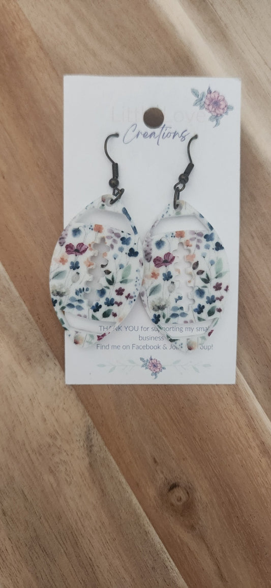 Acrylic floral football danglr 