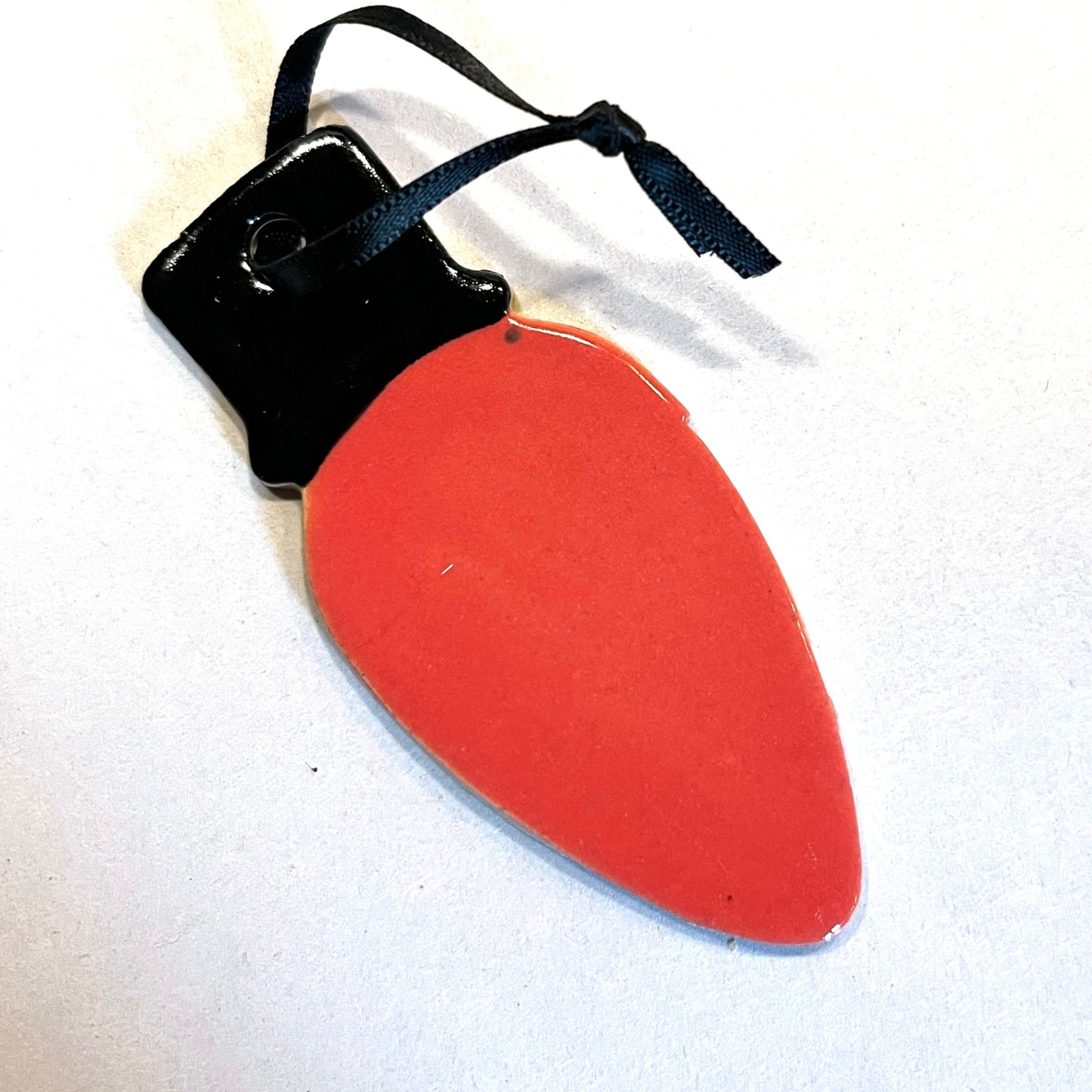 Light bulb ornament - red