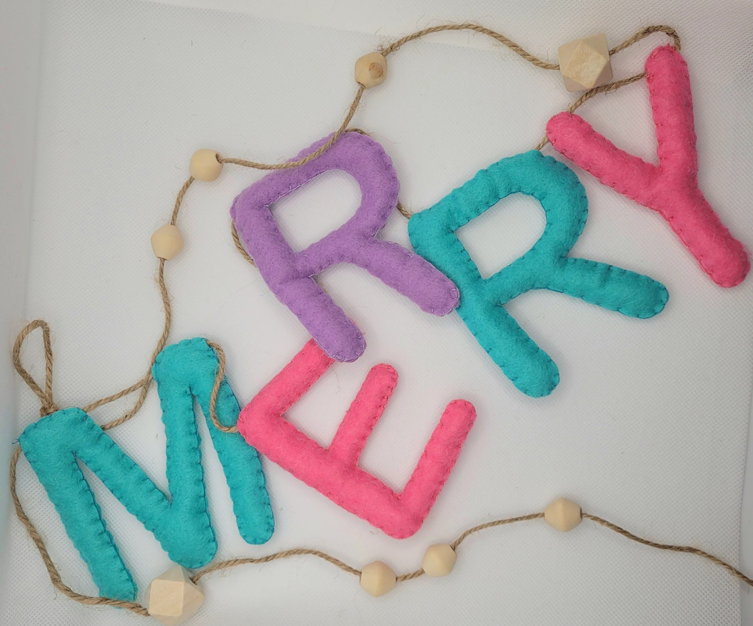 047 - Hand stitched "MERRY" felt garland, 60", wood beads