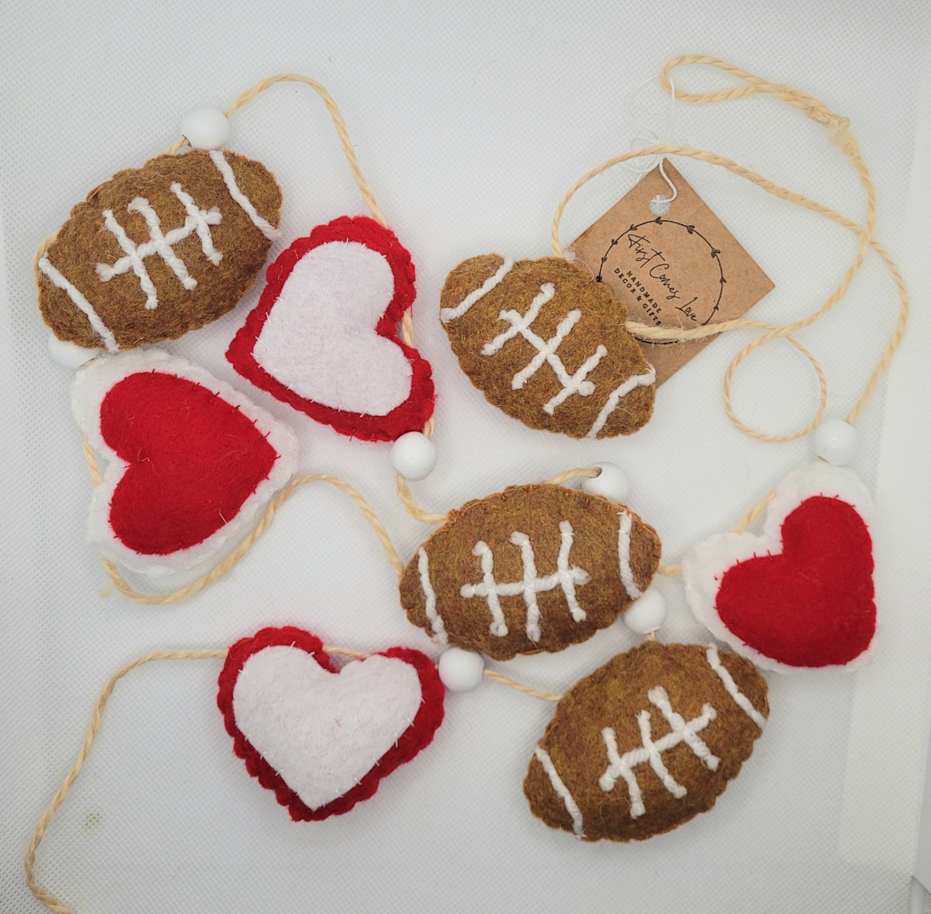047 - Hand stitched felt garland, Football, Red and White Hearts, Wood beads