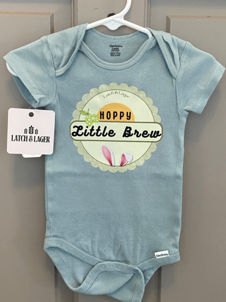 061 - "Hoppy Little Brew" Easter Infant Bodysuit | 12 Months | Light Teal Blue