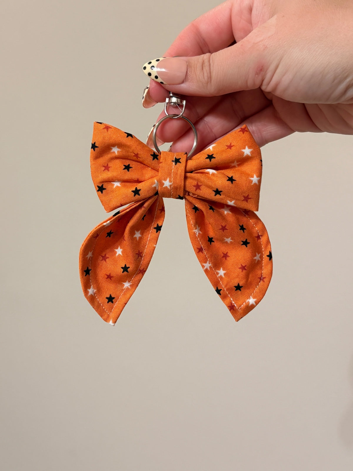 063 - Orange Stars Bow Keychain