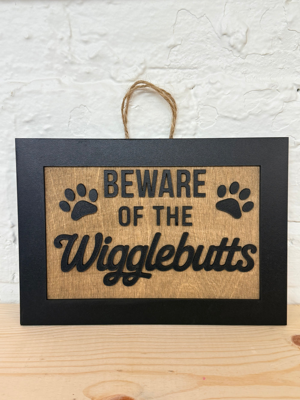 Beware of the Wigglebutts Black Wooden Sign