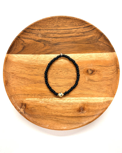 022 - Black Seed Bead Bracelet with Dalmation Stone Accent