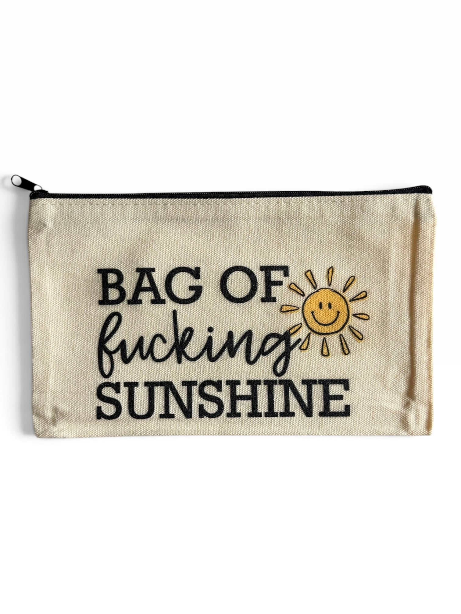 A beige canvas zippered pouch with black text reading 'BAG OF fucking SUNSHINE' and a small yellow smiling sun graphic, shown on a plain white background.