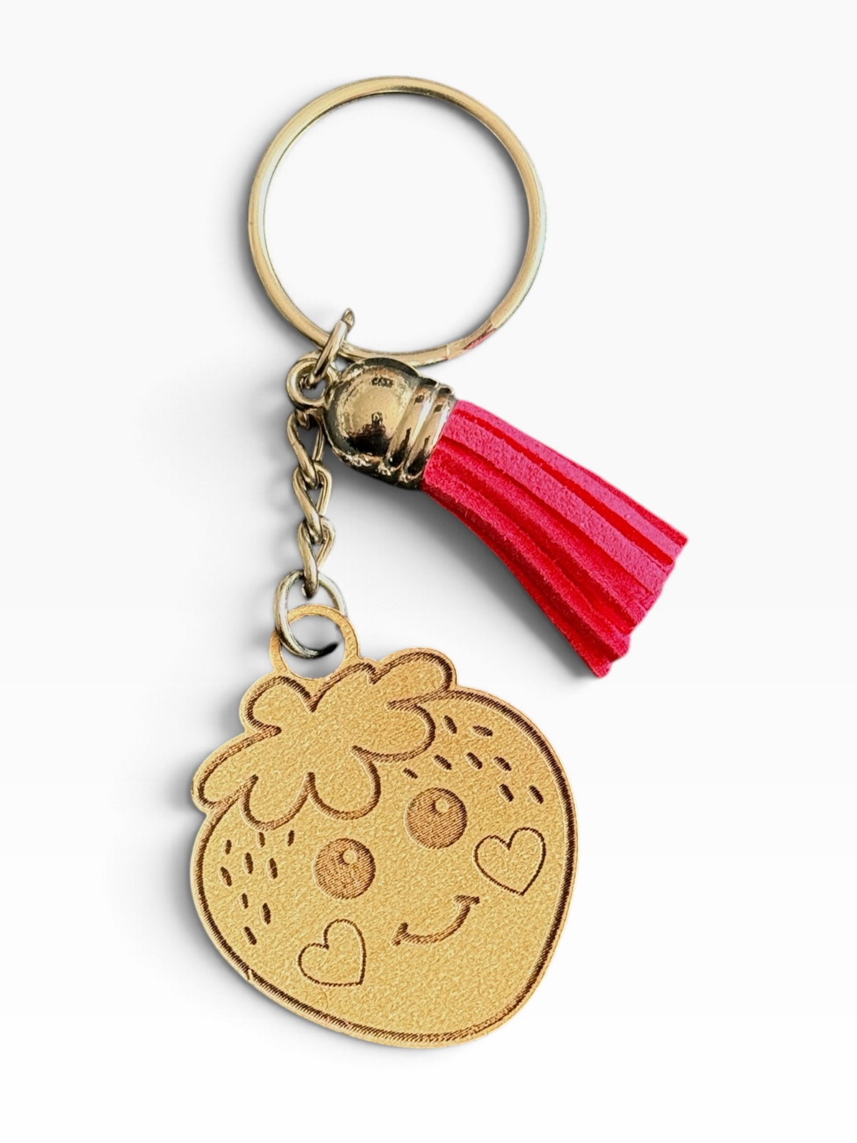 Cute laser engraved wood strawberry keychain with pink tassel handmade by Maxilyn House in Racine Wisconsin