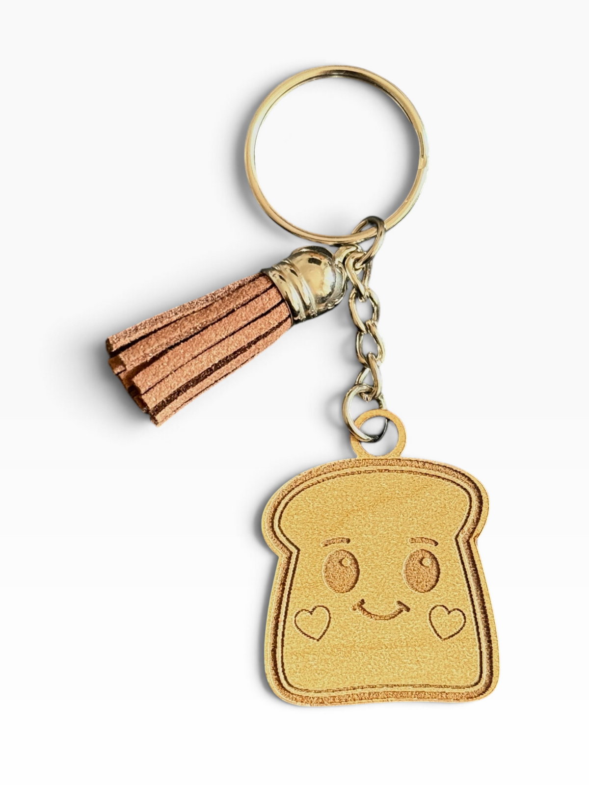 Cute laser engraved smiling toast wood keychain with brown tassel handmade by Maxilyn House in Racine Wisconsin