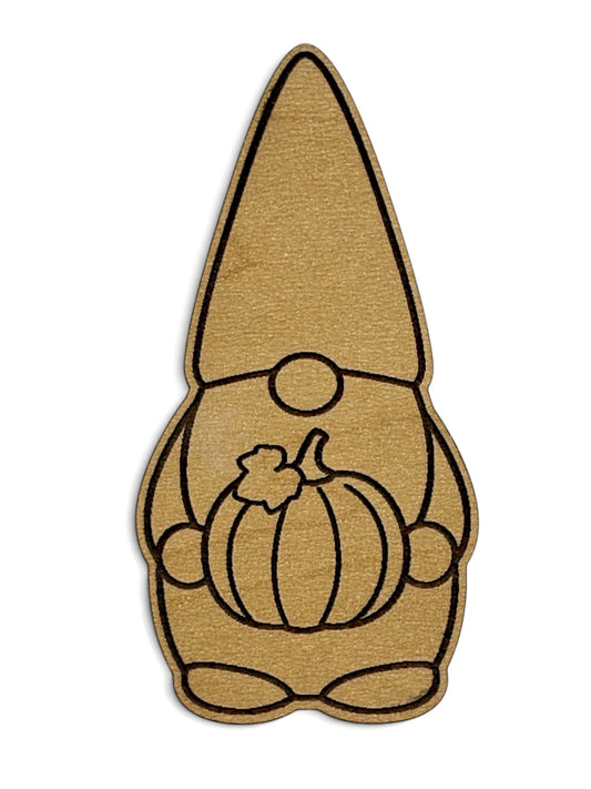 Engraved wooden fall gnome magnet holding a pumpkin