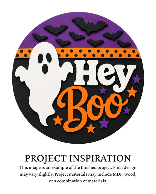 Project inspiration photo for the Hey Boo Ghost & Bats DIY round door sign with white ghost, flying bats and colorful lettering.