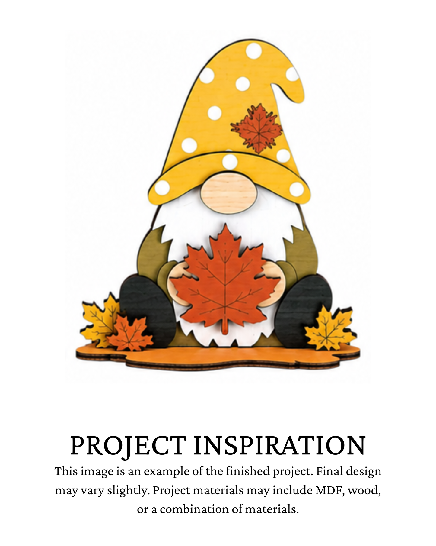 Finished project example of a layered fall gnome shelf sitter wearing a yellow hat and holding a large red-orange maple leaf with fall leaves at the base. Text below reads “PROJECT INSPIRATION,” describing it as a finished project example.