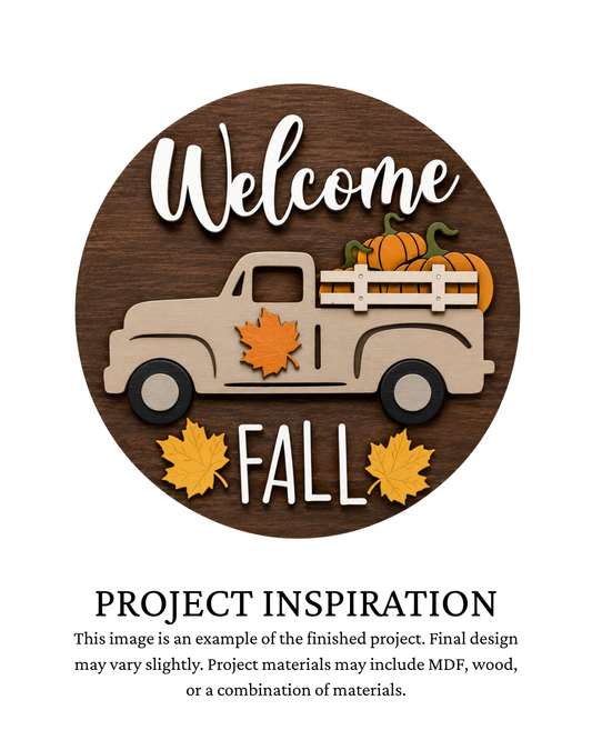Finished project example of a layered round door sign featuring a vintage pickup truck filled with pumpkins and autumn foliage with “Welcome Fall” lettering. Text below reads “Project Inspiration.”